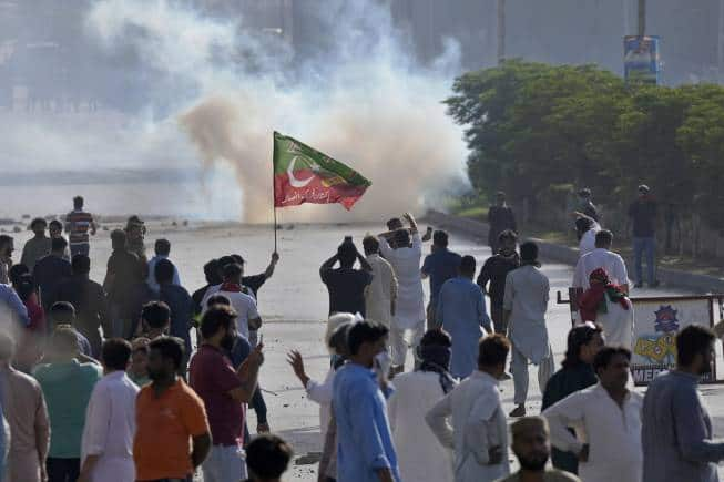 Imran Khan S Arrest Triggers Mayhem In Pakistan Supporters Storm Army