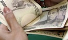 Asian currencies set for a wild ride in 2015