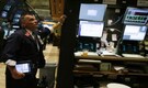 Wall St little changed as Ukraine, China woes brushed off