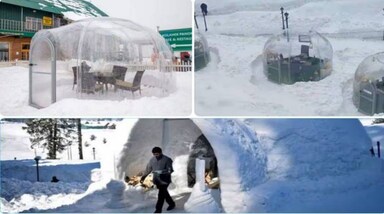 Snowfall in Gulmarg: गुलमर्ग में बर्फ से ढके पहाड़ों के बीच कश्मीर के हिल स्टेशन में एक ग्लास इग्लू रेस्तरां (Glass Igloo Restaurant) पर्यटकों के बीच आकर्षण का केंद्र बना हुआ है। इस होटल को कोलाहोई ग्रीन हाइट्स (Kolahoi Green Heights) ने तैयार किया है। सोशल मीडिया पर घाटी के इस पहले बर्फ से ढके रेस्टोरेंट की तस्वीरें जमकर वायरल हो रही हैं।