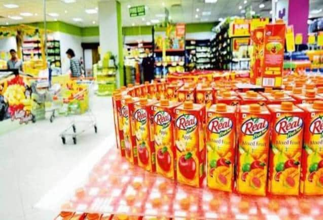 DABUR के Q1 अपडेट रहे अच्छे, ब्रोकरेज से जानें स्टॉक को खरीदें या बेचें