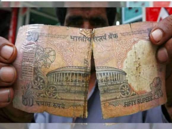 कटे-फटे या फिर टेप लगे नोटों को बदलने के क्या हैं नियम, जानें बैंक में क्या है बदलवाने का तरीका