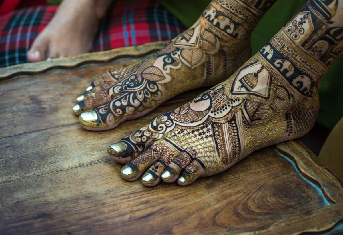 The,Photo,Shows,A,Pair,Of,Feet,Adorned,With,Intricate
