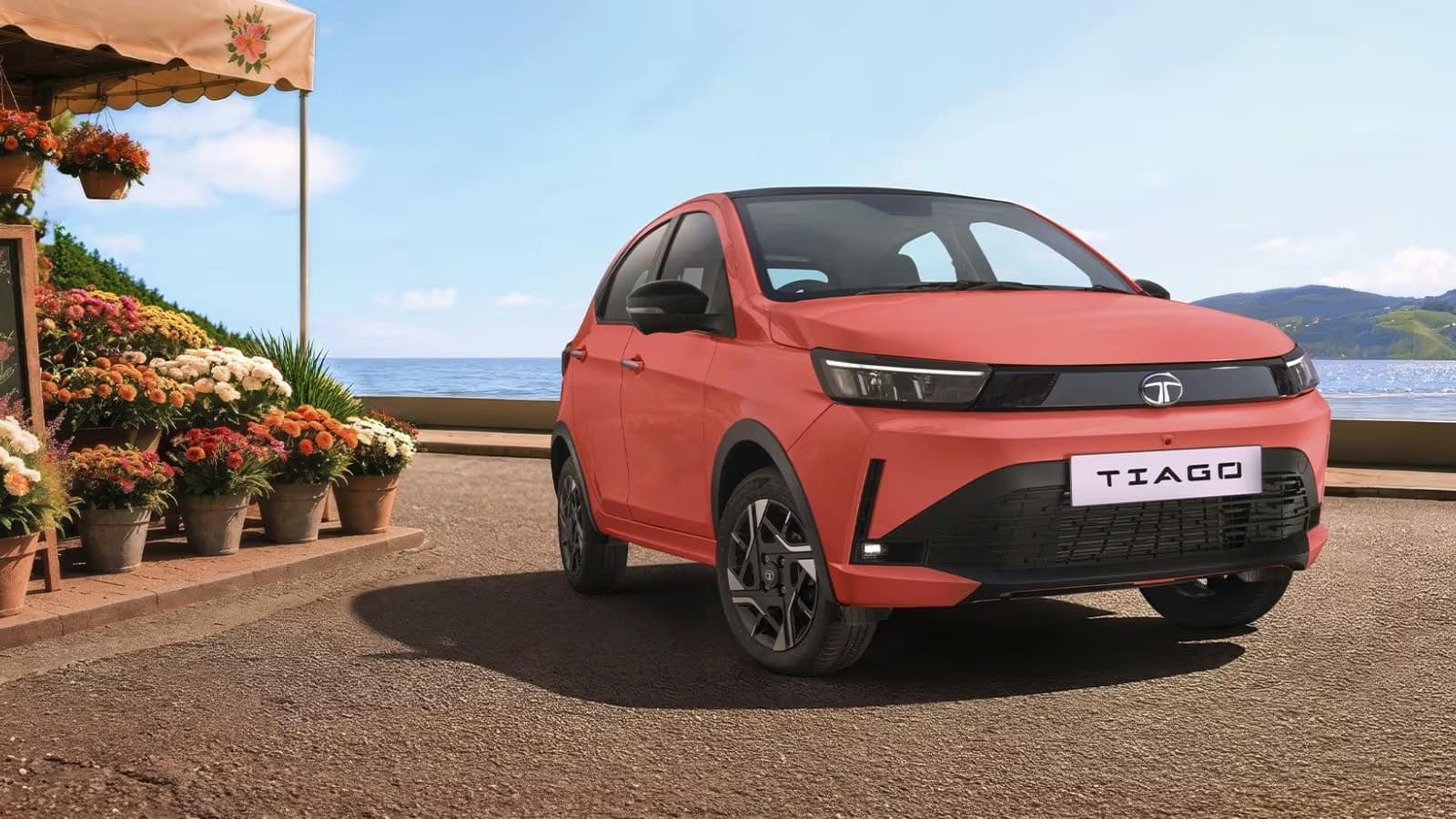 Tata Tiago: इस एंट्री-लेवल हैचबैक ने जुलाई 2026 में 7,429 यूनिट्स की बिक्री दर्ज की, जो पिछले साल इसी महीने में बिकी 5,575 यूनिट्स के मुकाबले 33% ज्यादा है। इसकी किफायती कीमत, बेहतर माइलेज और भरोसेमंद होने की वजह से यह बजट का ध्यान रखने वाले खरीदारों के बीच लगातार लोकप्रिय बनी हुई है।  Tiago की मांग छोटे शहरों में भी मजबूत बनी हुई है, खासकर उन लोगों के बीच जो पहली बार कार खरीद रहे हैं और रोजाना इस्तेमाल के लिए एक किफायती और प्रैक्टिकल हैचबैक की तलाश में हैं।