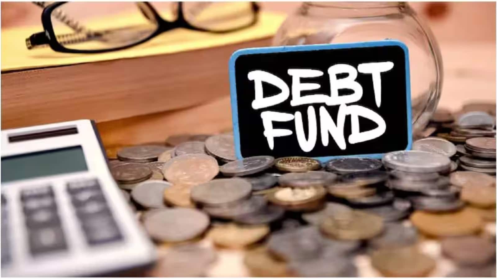Debt Fund Calculator: डेट फंड में 10 लाख रुपये का निवेश 10 साल में बढ़कर कितना हो जाएगा? Debt Fund Calculator: डेट फंड में 10 लाख रुपये का निवेश 10 साल में बढ़कर कितना हो जाएगा?