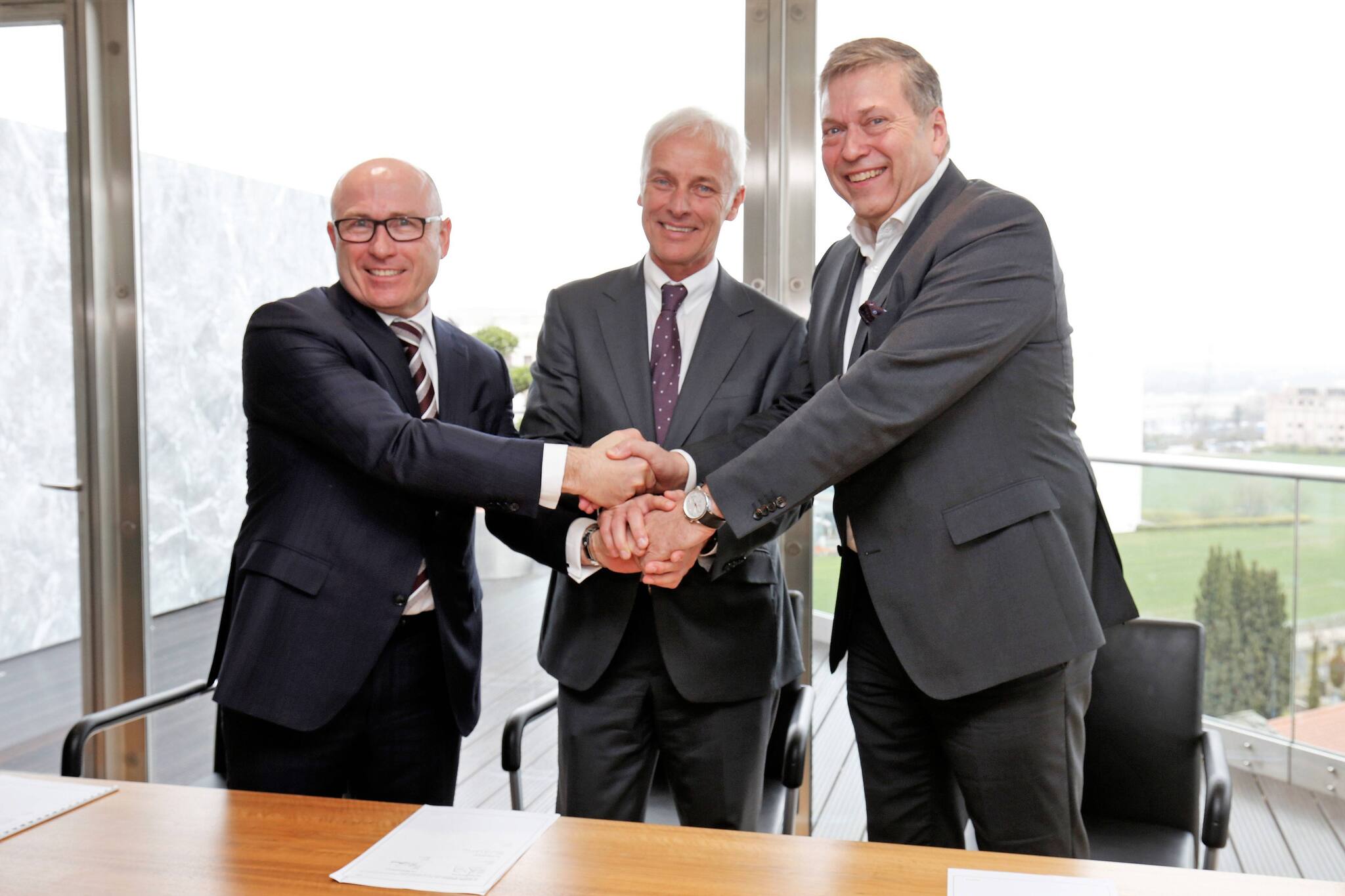 - Tata Motors and Volkswagen Group have signed a Memorandum of Understanding, which forms the basis for exploring long-term strategic alliance for joint product development projects. From left to right: Bernhard Maier, CEO of ŠKODA Auto, Matthias Müller, CEO of Volkswagen AG and Günter Butschek, CEO & Managing Director of Tata Motors Ltd.