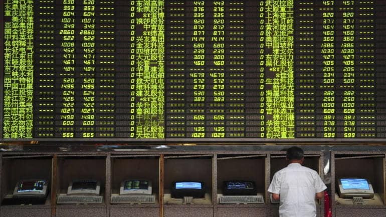 Asia shares track Wall Street higher as investors await earnings