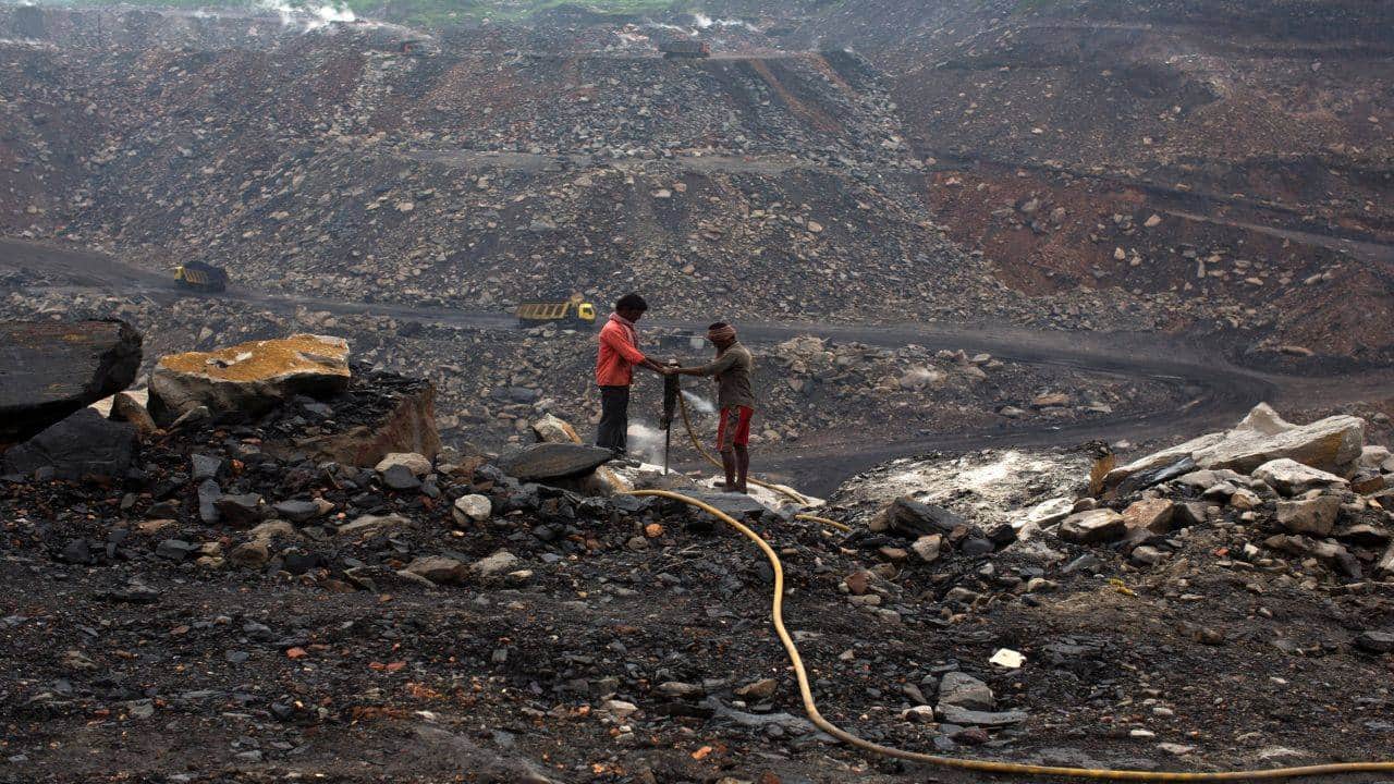 Workers drill at an open cast coal field at Dhanbad district in Jharkhand (Image: Reuters) Workers drill at an open cast coal field at Dhanbad district in Jharkhand (Image: Reuters)