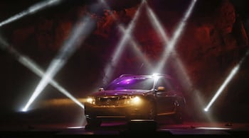 A newly-unveiled Nissan "Terrano" compact sport utility vehicle is pictured during a news conference in Mumbai August 20, 2013. Nissan Motor Co on Tuesday unveiled its redesigned "Terrano" compact sport utility vehicle in India, aiming to tap the relatively strong demand for affordable crossover vehicles, despite the doldrums the country's overall auto market has suffered this year. REUTERS/Danish Siddiqui (INDIA - Tags: TRANSPORT BUSINESS) - RTX12RDX