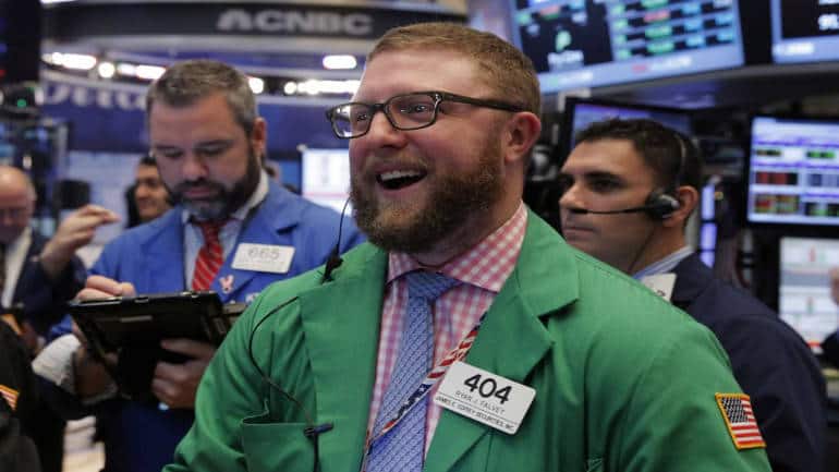 Wall St gains, SP hits record closing high as CPI meets expectations