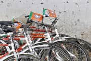 Bicycles decorated with India's main opposition BJP flags and an image of Modi, prime ministerial candidate for BJP, are parked inside BJP headquarters in New Delhi