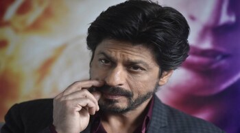 Bollywood actor Shah Rukh Khan pauses during an interview with Reuters at Madame Tussauds in London, Britain April 13, 2016.  REUTERS/Hannah McKay - RTX29TPF