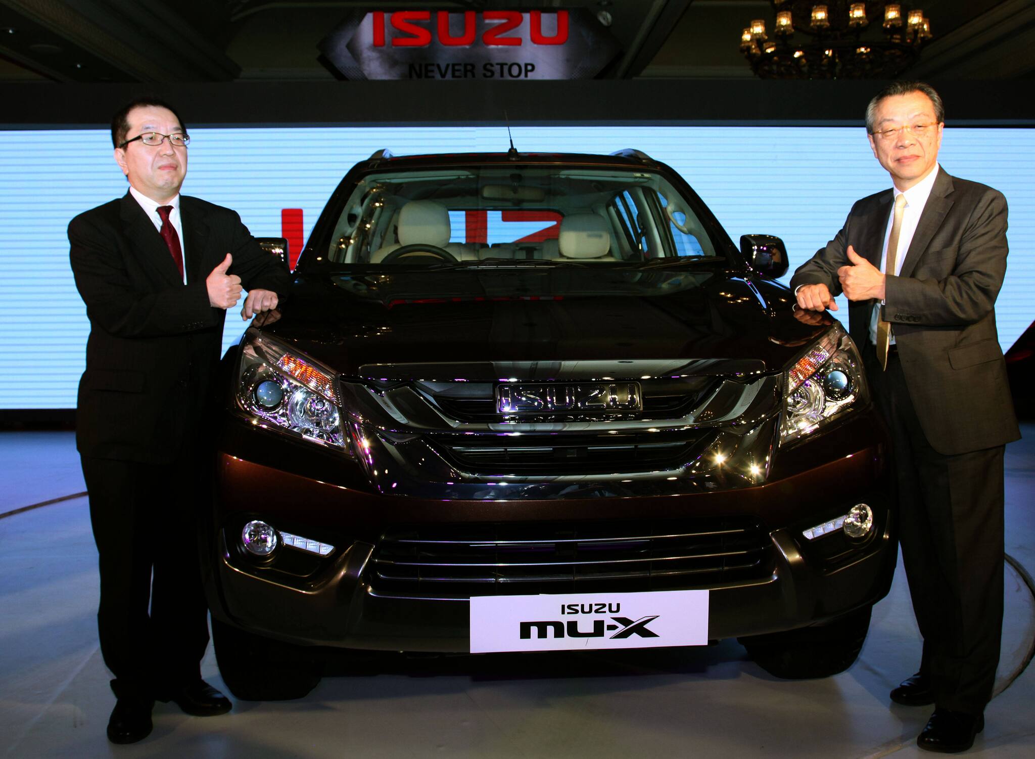 Hiroshi Nakagawa(R),Director of Board,Isuzu Motors ltd.,Japan and Chairman ,Isuzu Motors India and NaoiiroYamaguchi,MD,Isuzu Motors India, during the launch of Mu-XIsuzu SUV, in New Delhi on Thursday.