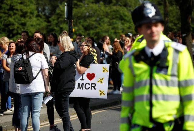 A police officer stands outside the Old Trafford Cricket Ground ahead of the One Love Manchester tribute concert in Manchester, Britain, June 4, 2017. REUTERS/Phil Noble - RTX38YZZ