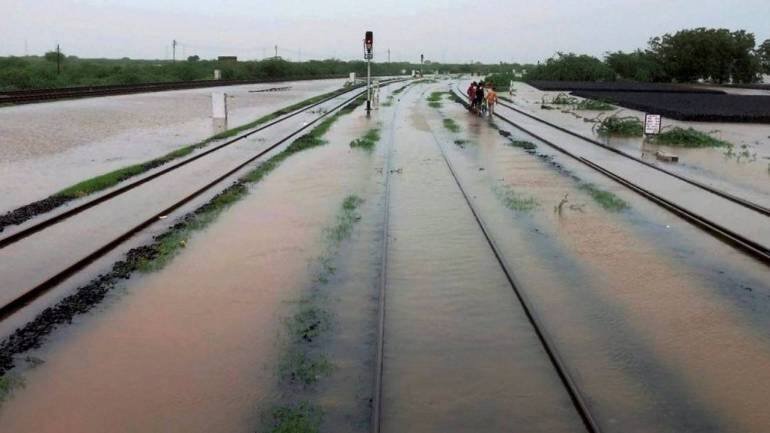 Gujarat floods: 25,000 people evacuated as heavy rain lash state ...
