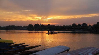 Evening View of world Famous Dal lake in Srinagar, Jammu &amp; Kashmir on 7 September 2017. The urban lake, which is the second largest in the state, is integral to tourism and recreation in Kashmir. The lake is also an important source for commercial operations in fishing and water plant harvesting. (Photo by Nasir Kachroo/NurPhoto via Getty Images)