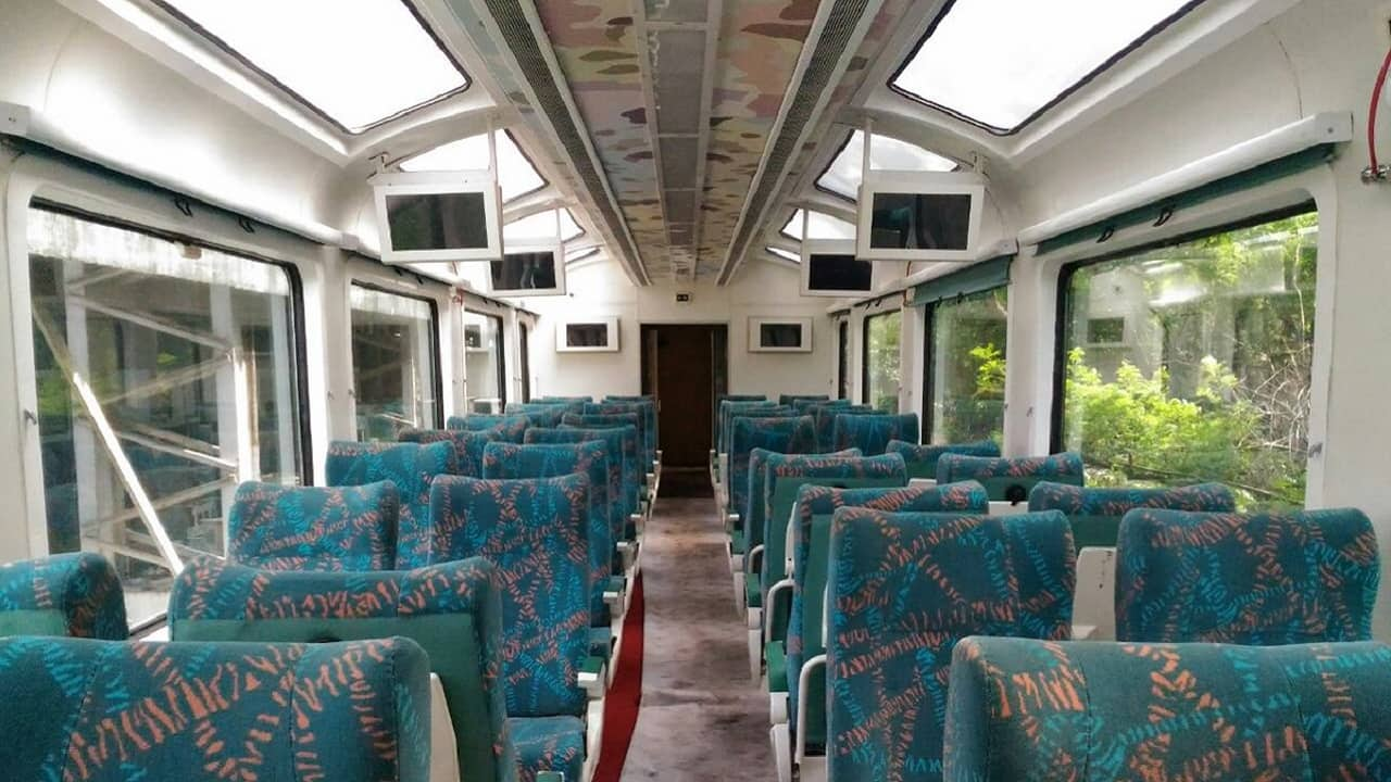 This Mumbai Goa train compartment has a glass roof LCD screens