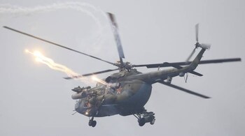 A Belarussian Mi-8 helicopter fires while flying above a firing range during the Zapad-2017 war games, held by Russian and Belarussian servicemen, outside the town of Ruzhany in Belarus, September 17, 2017. REUTERS/Vasily Fedosenko - UP1ED9H10DZMZ