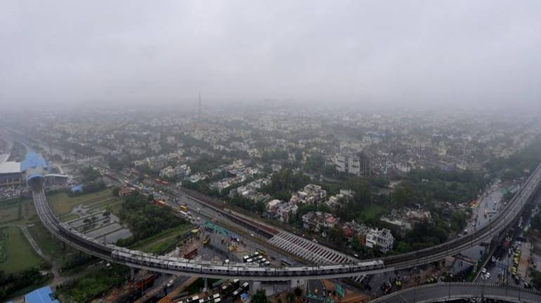 Noida, India - September 23: Pleasant Weather In Delhi-Ncr Due To Heavy Rainfall, On September 23, 2017 In Noida, India. The National Capital Region Witnessed Cloudy Skies And Light Showers On Saturday Morning For The Second Consecutive Day. The Dip In Temperature Has Brought Some Much Needed Respite From The Sweltering Heat In The Region. 