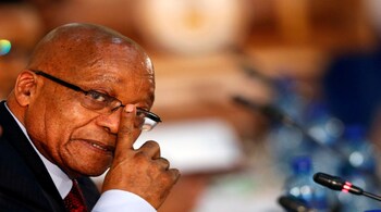 South African president Jacob Zuma gestures as he hosts his Zimbabwean counterpart, President Robert Mugabe during the 2nd Session of the South Africa-Zimbabwe Bi-National Commission in Pretoria, South Africa October 3, 2017. REUTERS/Siphiwe Sibeko - RC1F09135900