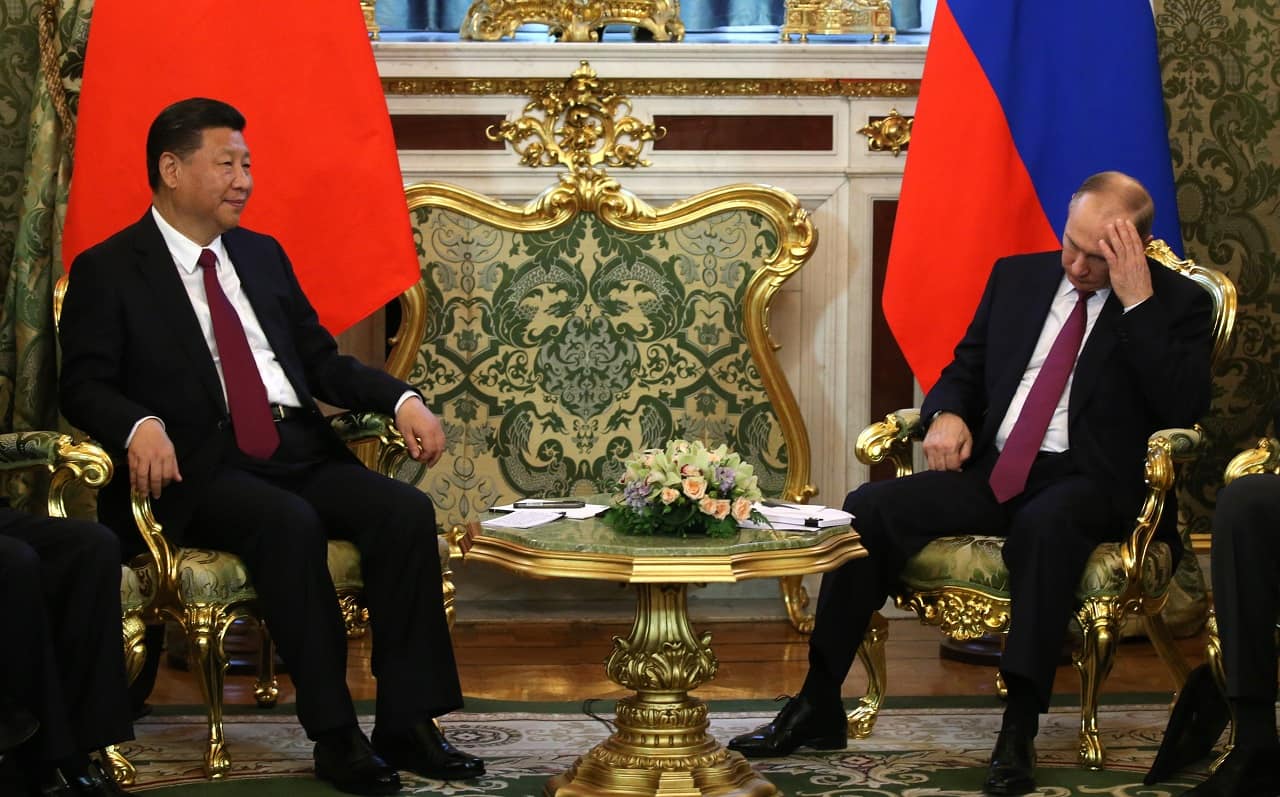 File image of Russian President Vladimir Putin (R) and Chinese President Xi Jinping (L) meeting at the Grand Kremlin Palace in Moscow, in 2017 (Photo by Mikhail Svetlov/Getty Images)