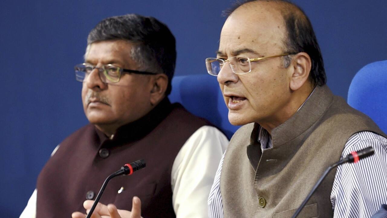 Union Minister for Finance and Corporate Affairs, Arun Jaitley addresses the media after a cabinet meeting, in New Delhi on Wednesday. Union Law &amp; Justice Minister Ravi Shankar Prasad is also seen. (PTI) 