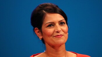 Britain's Secretary of State for International Development Priti Patel addresses the Conservative Party conference in Manchester, October 3, 2017. REUTERS/Hannah McKay - RC146AB7F110