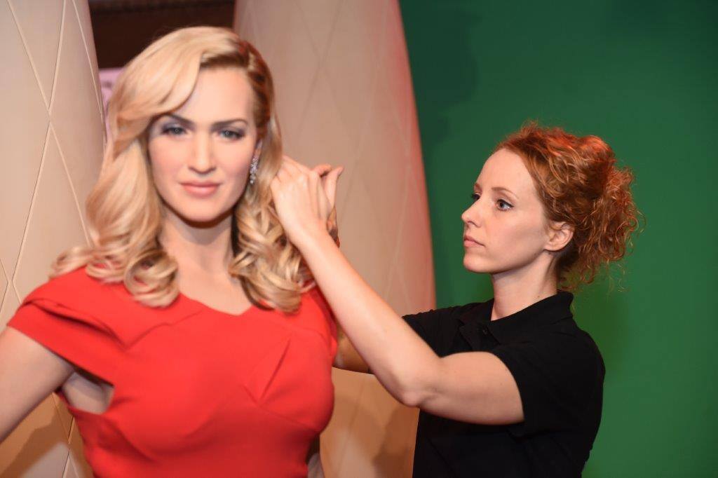 The Dressmaker | A worker gives finishing touches to the wax statue of English actress Kate Winslet. Apart from these celebrities, the museum showcases wax figures of Leonardo De Caprio, Madhubala, Mahatma Gandhi, Sachin Tendulkar, Lionel Messi, Bhagat Singh among many. (Source: Madame Tussauds Delhi)