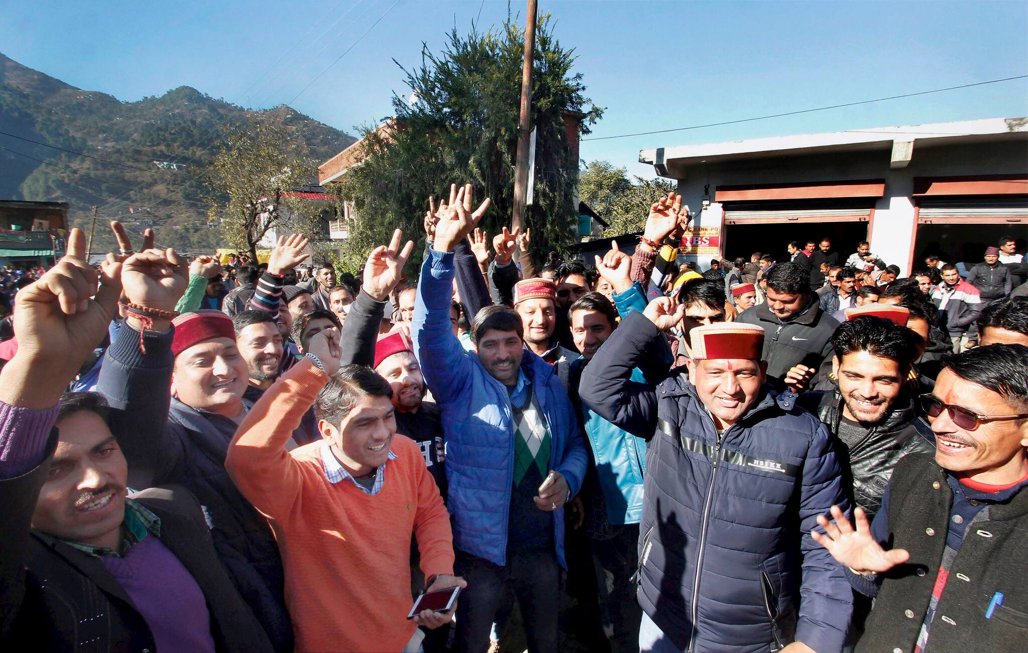 BJP supporters celebrating their party's success in Himachal Pradesh assembly elections outside a counting centre, at Chamba on Monday. (PTI)