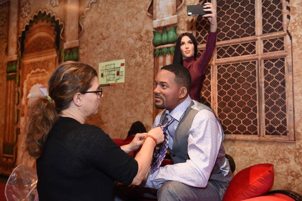 The Pursuit of Happyness | A museum staff dressing the wax figure of actor Will smith; TV personality Kim Kardashian’s statue stands in the background. Each wax figure is created with the expertise of over 20 international artists. They cost in an excess of Rs 1.5 crore each. (Source: Madame Tussauds Delhi)