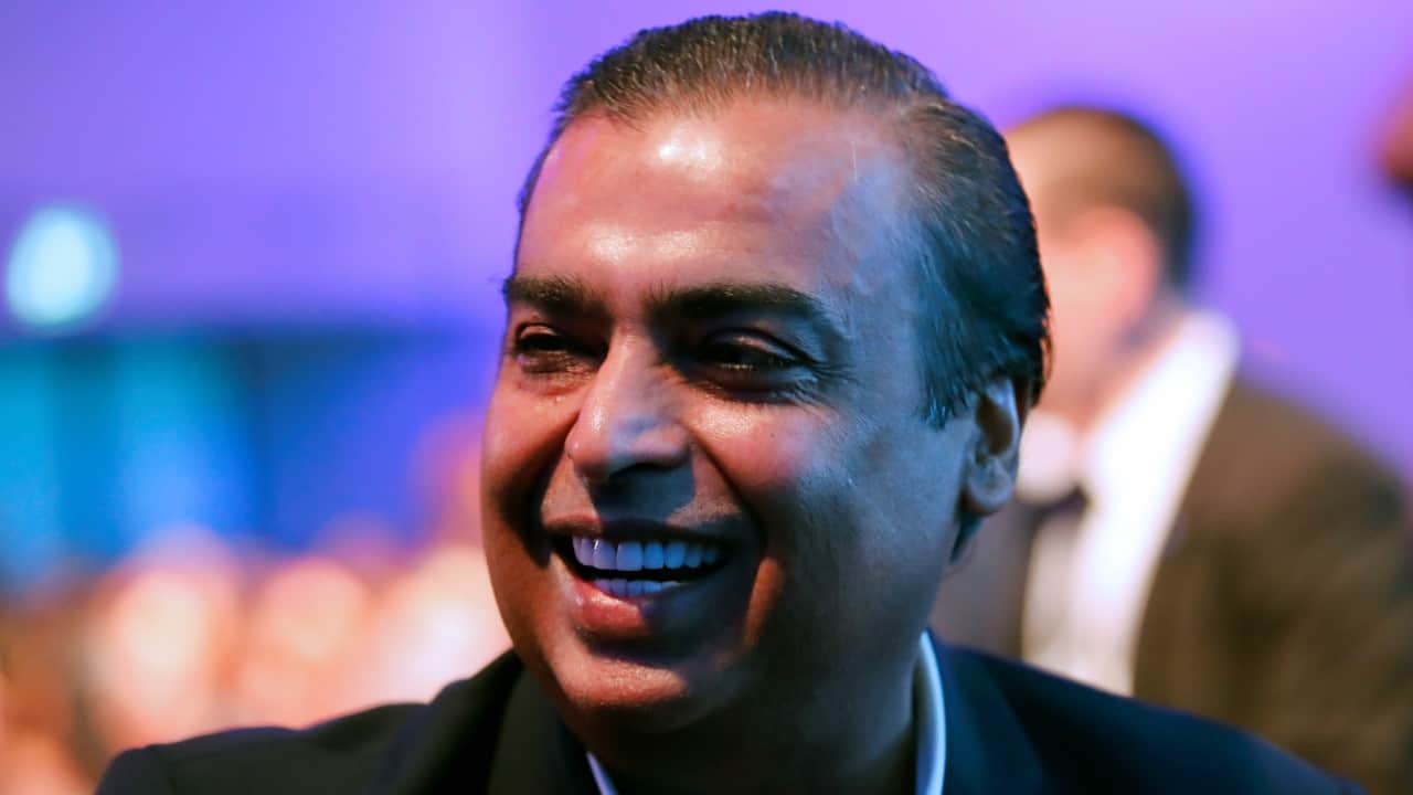 Mukesh Ambani, Chairman and Managing Director of Reliance Industries, smiles as he attends the World Economic Forum (WEF) annual meeting in Davos, Switzerland (REUTERS)