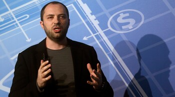 WhatsApp Chief Executive Officer and co-founder Jan Koum delivers a keynote speech at the Mobile World Congress
in Barcelona February 24, 2014. The world's biggest messaging service WhatsApp, which Facebook has just bought for $19 billion, will add voice calls to its product in the second quarter of this year, its chief executive Koum said on Monday. REUTERS/Albert Gea (SPAIN - Tags: BUSINESS TELECOMS) - GM1EA2O1PBW01