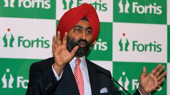 Malvinder Singh, Chairman of Fortis, speaks during a news conference in New Delhi July 26, 2010. Malaysian state investor Khazanah trumped India's Fortis Healthcare in a takeover battle for Singapore's Parkway with an offer that values Asia's biggest listed hospital operator at $3.3 billion. REUTERS/B Mathur (INDIA - Tags: BUSINESS HEALTH) - GM1E67Q1FD701