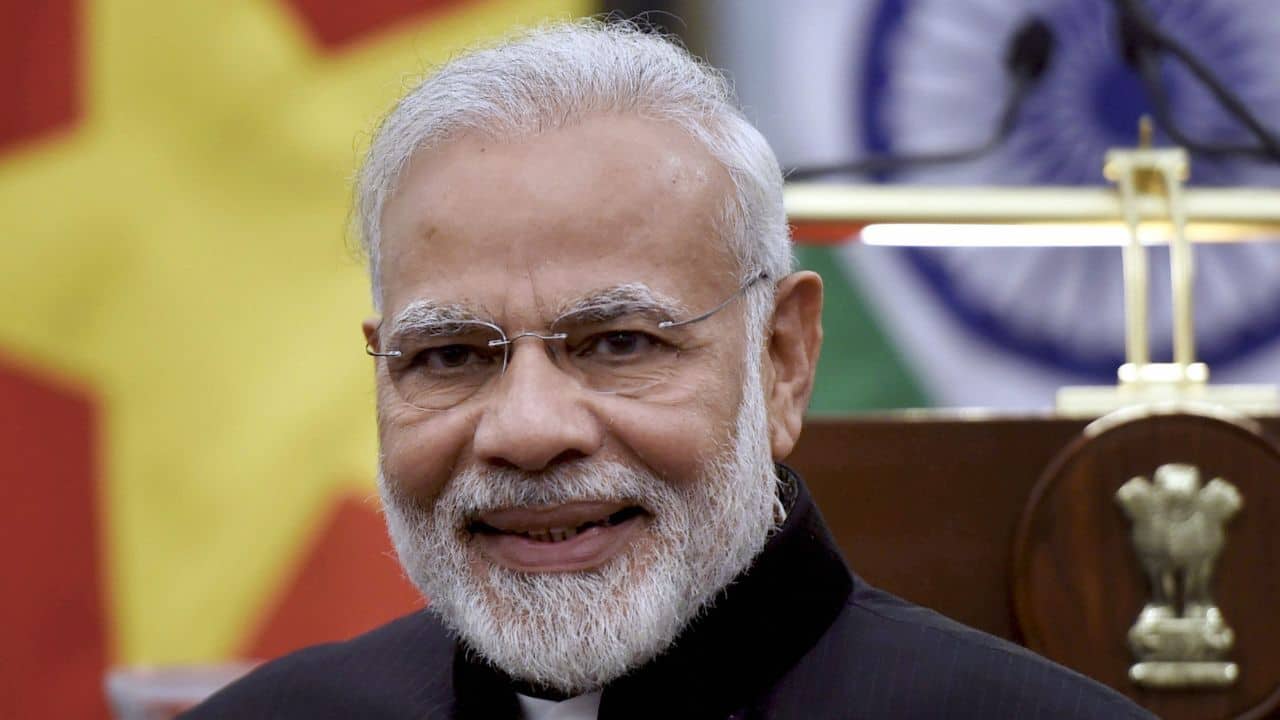 A Twitter user asked Narendra Modi to smile more, here's what he said