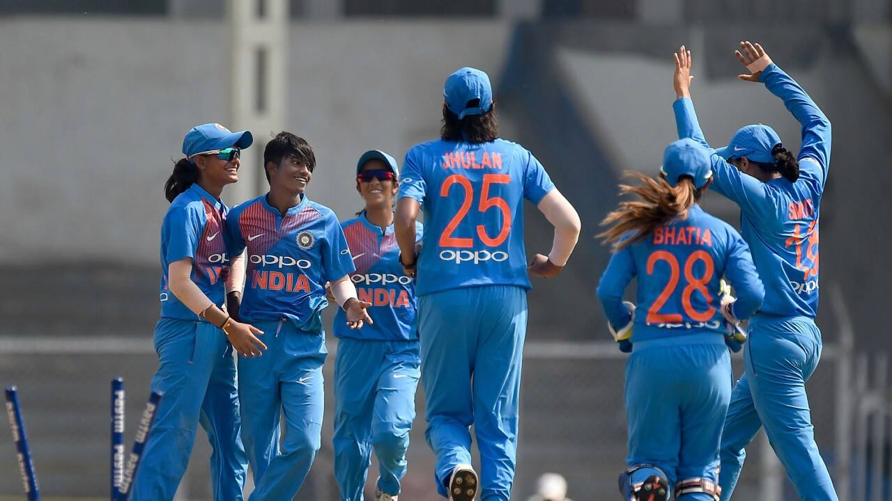Indian cricket team members celebrate the dismissal of Australia's Ashleigh Gardner during the Women's T20I Tri-series at Brabourne stadium in Mumbai. (PTI) Indian cricket team members celebrate the dismissal of Australia's Ashleigh Gardner during the Women's T20I Tri-series at Brabourne stadium in Mumbai. (PTI)