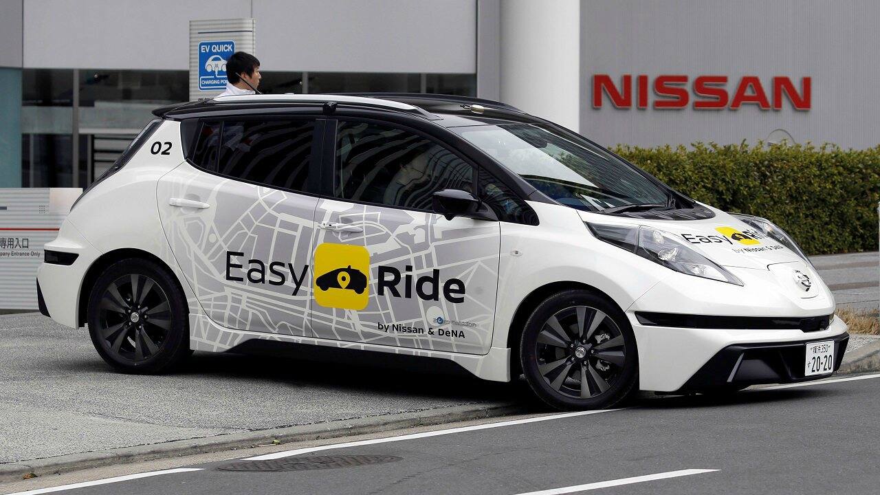 Japanese car maker Nissan is working on the Leaf model to introduce driverless cabs under the ‘Easy ride’ taxi service project. (Image: Reuters)