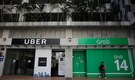 Ride-hailing firm Grab hits back in Uber takeover row