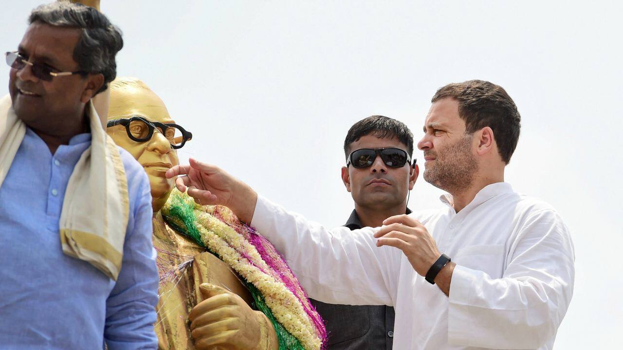 Congress President Rahul Gandhi paying homage to BR Ambedkar ahead of Karnataka Assembly elections in Kolar on 7th April 2018. (PTI Photo) Congress President Rahul Gandhi paying homage to BR Ambedkar ahead of Karnataka Assembly elections in Kolar on 7th April 2018. (PTI Photo)