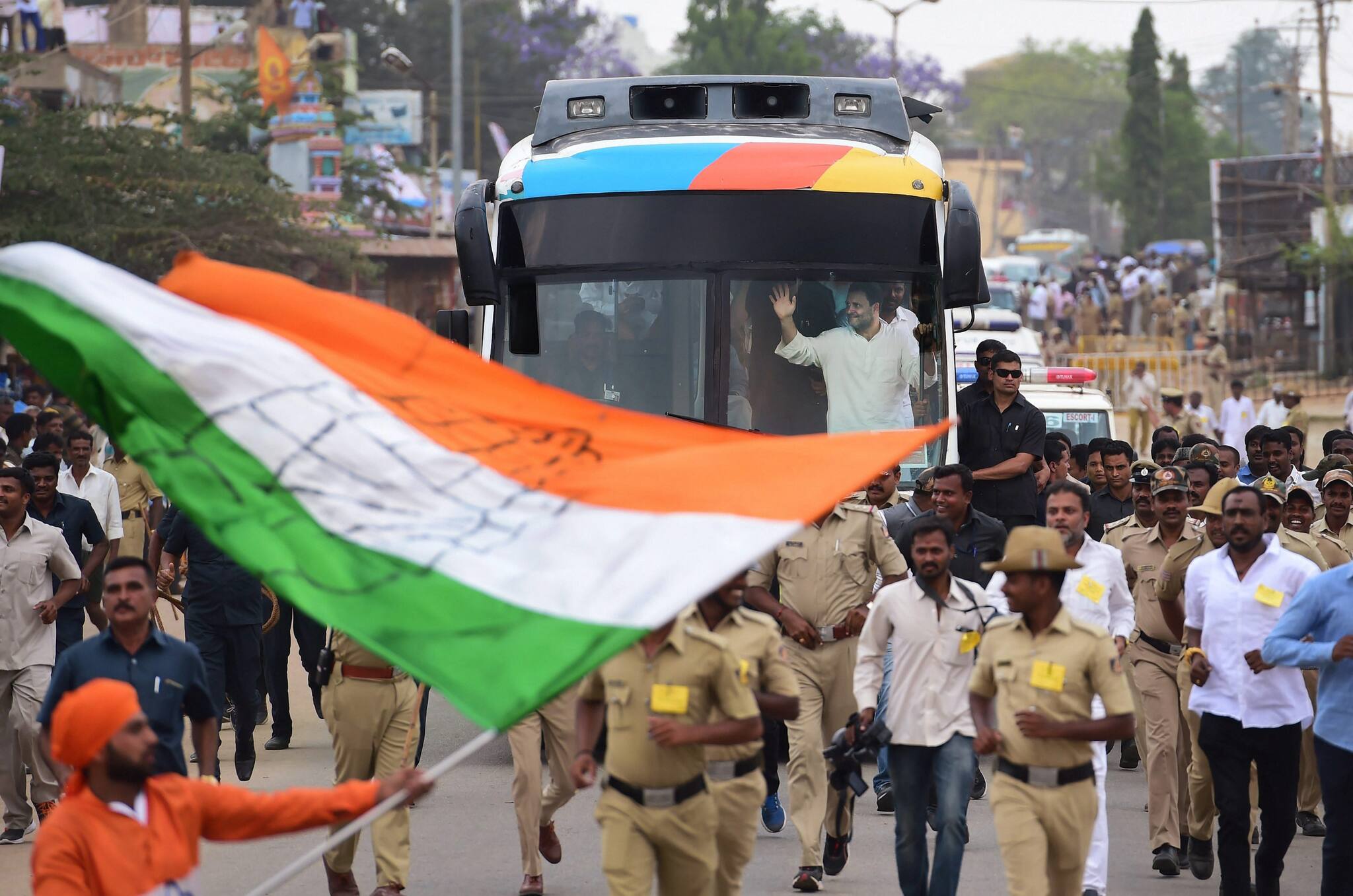Rahul Gandhi waves at his supporters ahead of Karnataka Assembly elections in Kolar on 7th April 2018. (PTI Photo) Rahul Gandhi waves at his supporters ahead of Karnataka Assembly elections in Kolar on 7th April 2018. (PTI Photo)