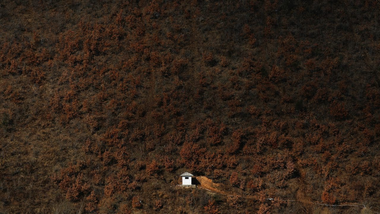 A North Korean watchtower is photographed from the Chinese side of the Yalu River east of Linjiang, China. (Image: Reuters)