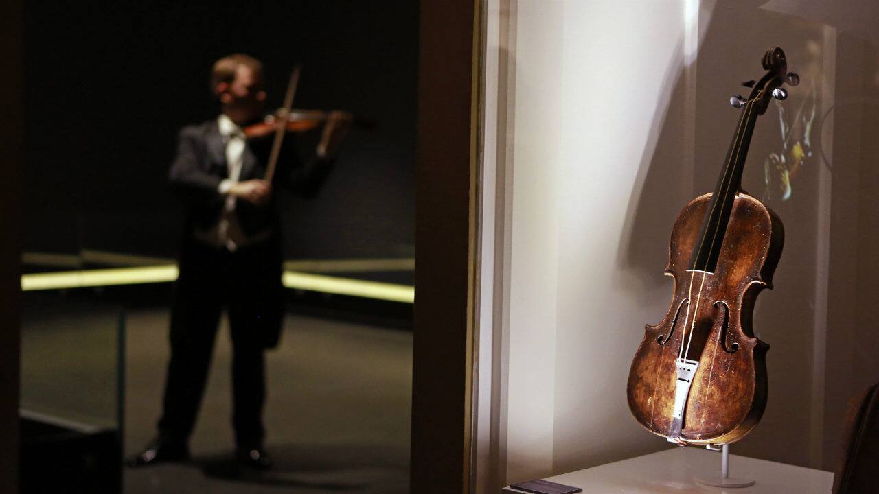 Pictured here is the violin that belonged to Titanic bandmaster Wallace  Hartley, seen on display at Titanic Belfast. It is often thought that  "Nearer, My God, To Thee" is the last song