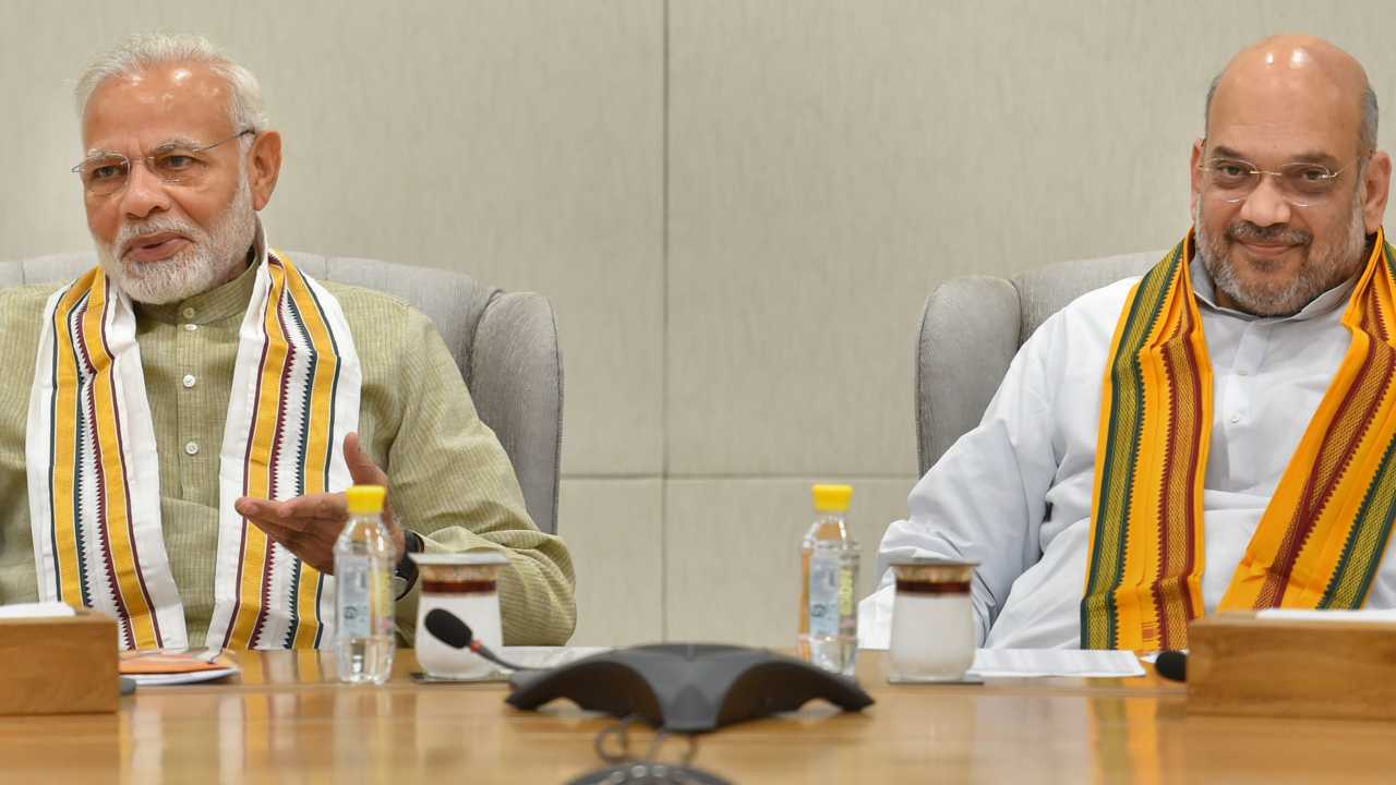 Prime Minister Narendra Modi and BJP President Amit Shah attending a meeting ahead of Karnataka Assembly Elections in New Delhi on 15th April 2018. (PTI Photo) Prime Minister Narendra Modi and BJP President Amit Shah attending a meeting ahead of Karnataka Assembly Elections in New Delhi on 15th April 2018. (PTI Photo)