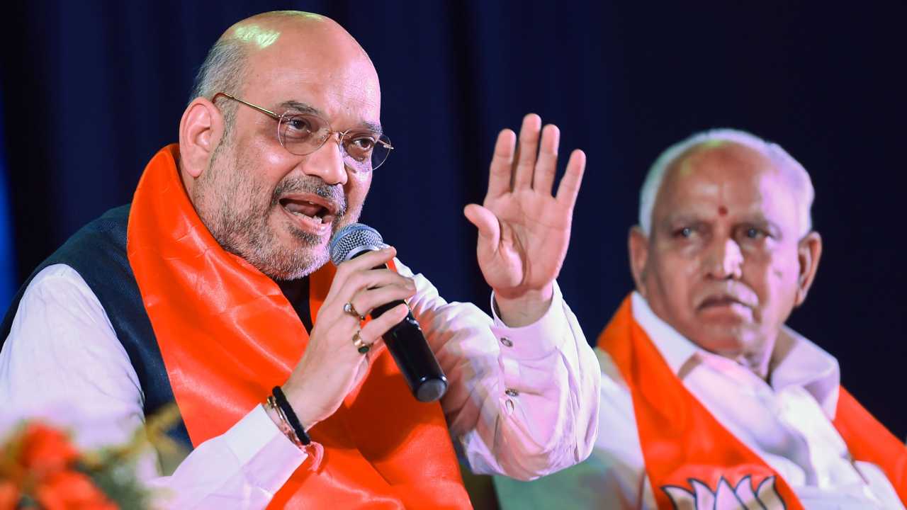 BJP chief Amit Shah and B S Yeddyurappa interacting with entrepreneurs ahead of Karnataka Assembly Elections in Bengaluru on 19th April 2018. (PTI Photo) BJP chief Amit Shah and B S Yeddyurappa interacting with entrepreneurs ahead of Karnataka Assembly Elections in Bengaluru on 19th April 2018. (PTI Photo)