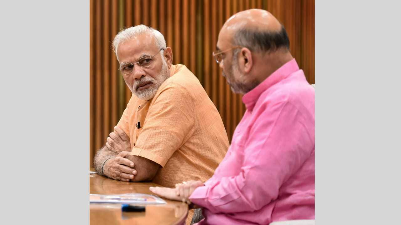 Prime Minister Narendra Modi and BJP President Amit Shah during an election committee meet at BJP Headquarters in New Delhi on 8th April 2018. (PTI Photo) Prime Minister Narendra Modi and BJP President Amit Shah during an election committee meet at BJP Headquarters in New Delhi on 8th April 2018. (PTI Photo)
