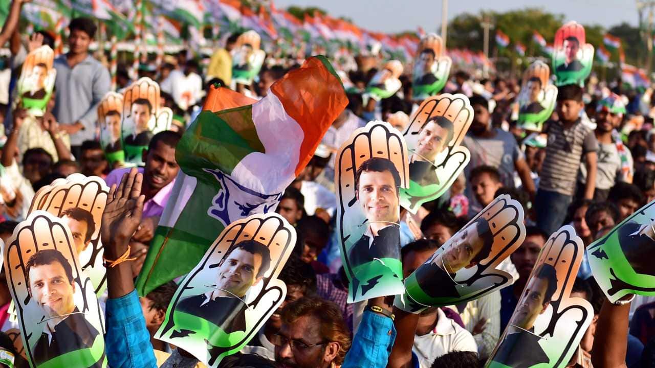 Supporters of Rahul Gandhi during a public rally on the last day of his Jana Aashirwada Yatra ahead of Karnataka Assembly elections in Bengaluru on 8th April 2018. (PTI Photo) Supporters of Rahul Gandhi during a public rally on the last day of his Jana Aashirwada Yatra ahead of Karnataka Assembly elections in Bengaluru on 8th April 2018. (PTI Photo)