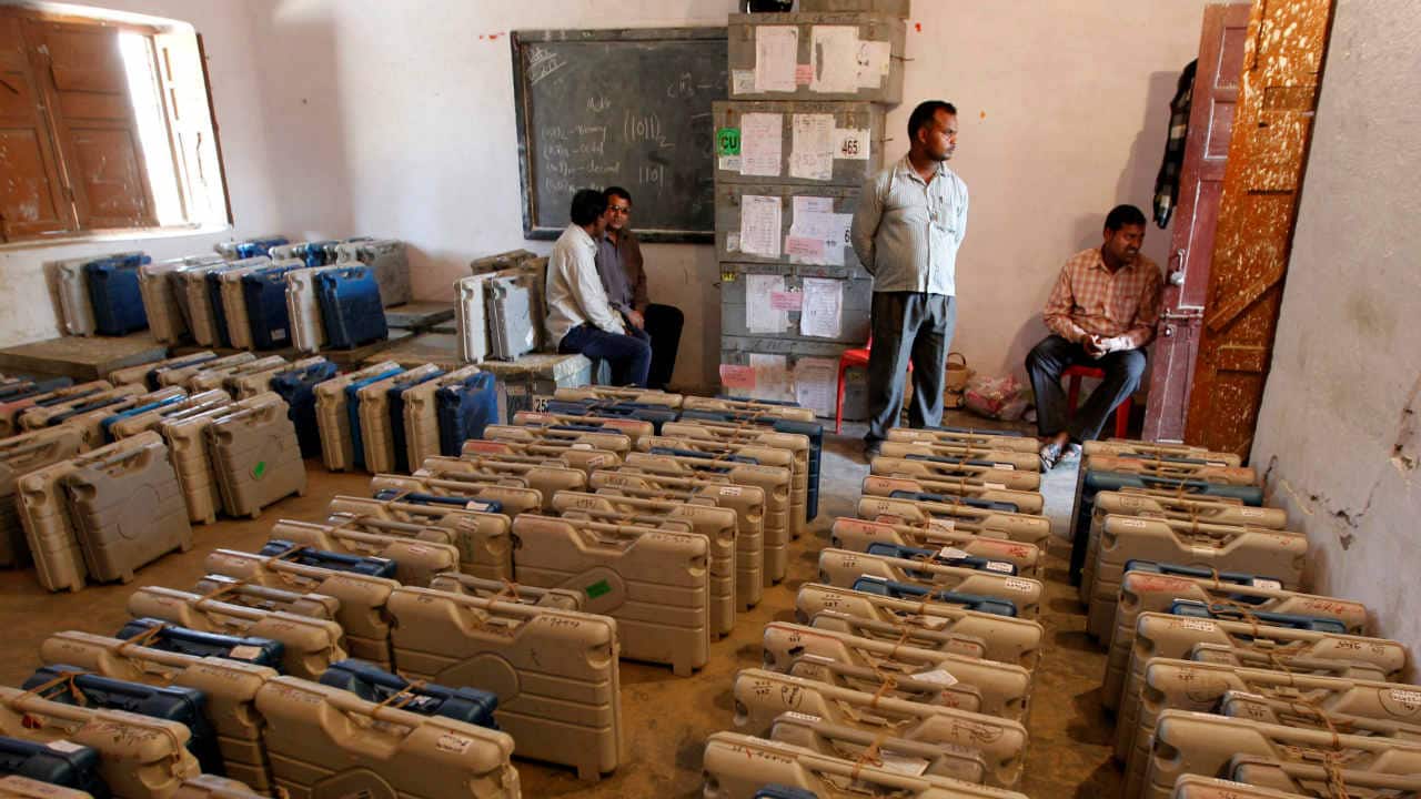 EVMs stashed inside cars, shops: Several videos on Twitter claim EVMs stashed inside cars, shops: Several videos on Twitter claim