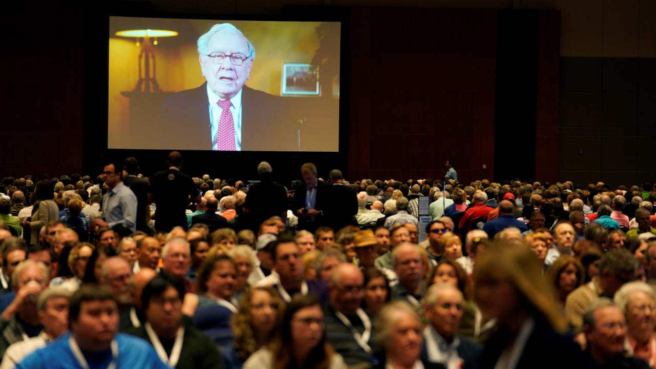 The high-point of the event is marked by the attendance of scores of Warren Buffet admirers and Berkshire investors who line up for hours before finally gathering at the exhibition space to hear the Berkshire CEO's speech. (Image: Reuters)
