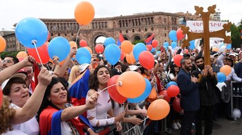 Supporters of Armenian protest leader Nikol Pashinyan gather in Republic Square as parliament holds a session to elect a new prime minister in Yerevan, Armenia. (Reuters)