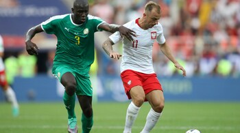 Group H - Poland vs Senegal - Spartak Stadium, Moscow, Russia - June 19, 2018 Poland's Kamil Grosicki in action with Senegal's Kalidou Koulibaly REUTERS-Carl Recine