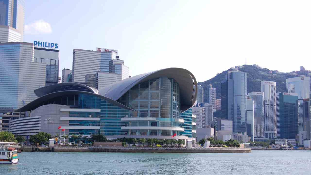 Hong Kong | The Asian financial hub will add 22 billionaires by 2027. Total wealth held in the city-state amounts to $1.3 trillion. Hong Kong is considered to be the gateway between Europe and Asia and it is home to the 7th largest stock exchange in the world. (The Hong Kong Convention and Exhibition Centre- Wikimedia Commons)